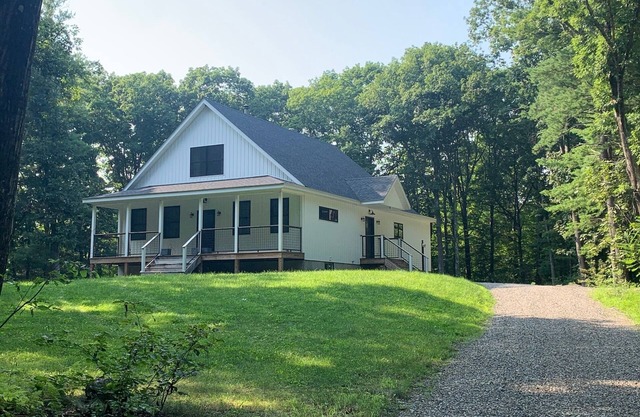 Forget your worries in this serene Modern Farm House.
