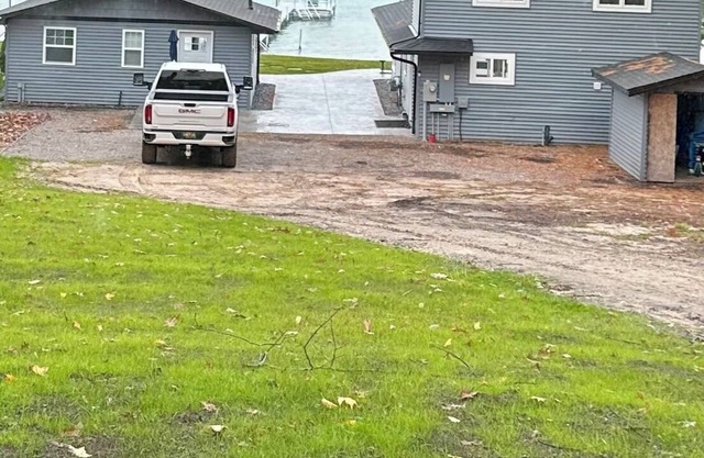 Gather in this modern retreat with boat mooring.