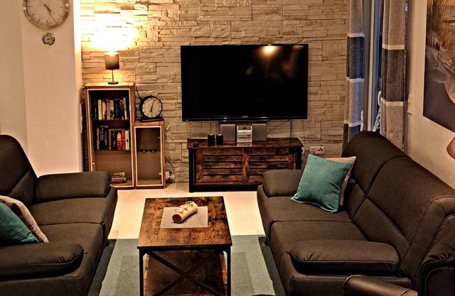 Gemütliches Ferienhaus mit Whirlpool, Sauna und Garten mit Deichblick