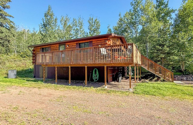 Get cozy in this quaint, cozy cottage in the woods!