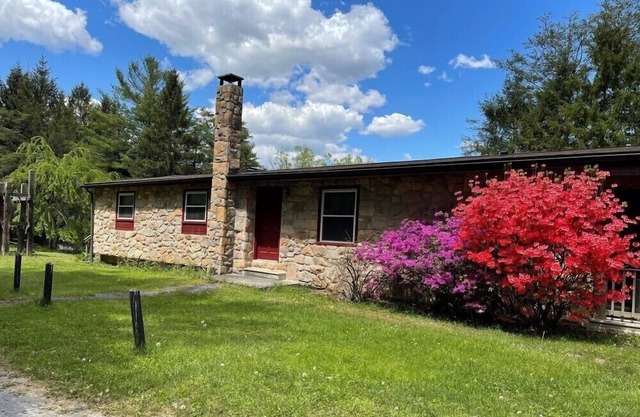 Great lodging for Penn State events and view of Lake Louise at Camp Golden Pond.