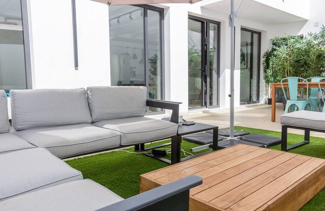 Ground floor with private patio next to the beach