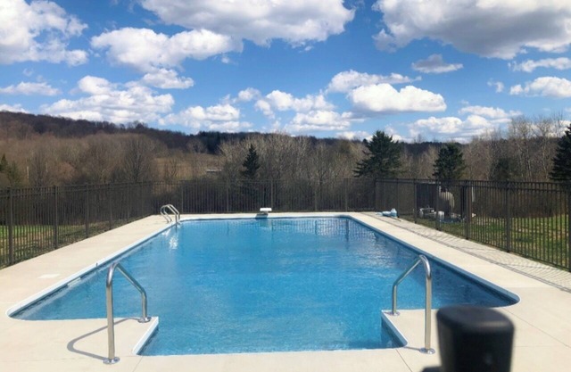 HEATED POOL! 4 Bed/3 Bath home on 30 acres with pond and trails!