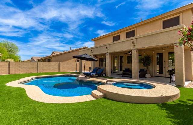Heated pool and spa! 4 bedrooms, fire place, BBQ