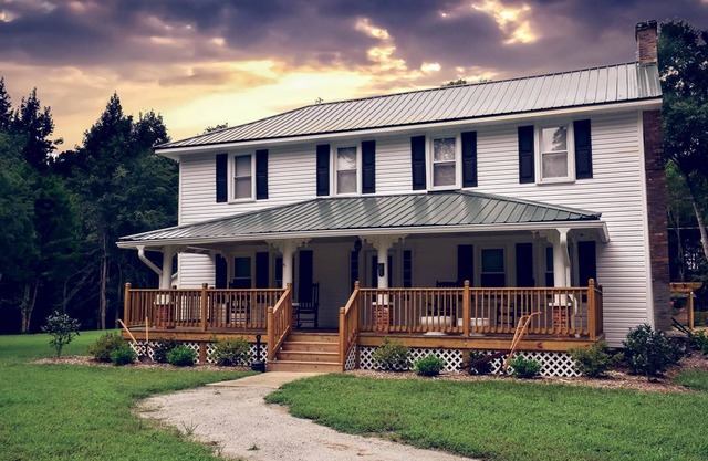 Historical 4 bedroom farmhouse located creek-side on 3 acres of beautiful nature