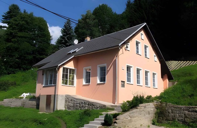 Holiday home with fireplace and sauna
