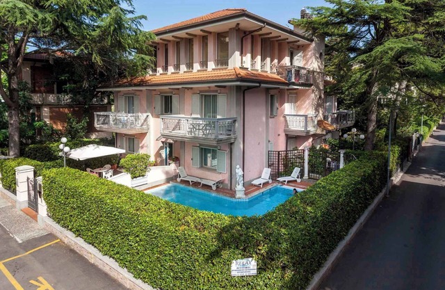 Holiday apartment on two floors with balcony and pool