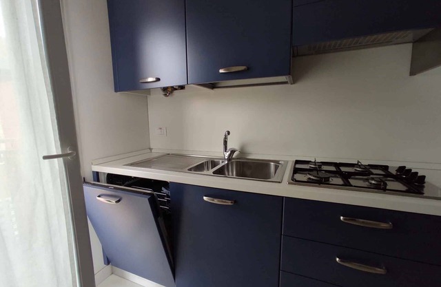 Holiday apartment with air conditioning and balcony overlooking the pine forest