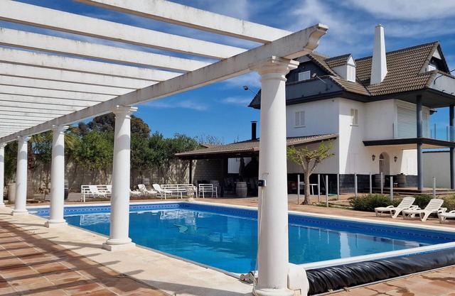 Holiday Home 'Los Rosales De La Palmilla' with Private Pool, Balcony and Air Conditioning