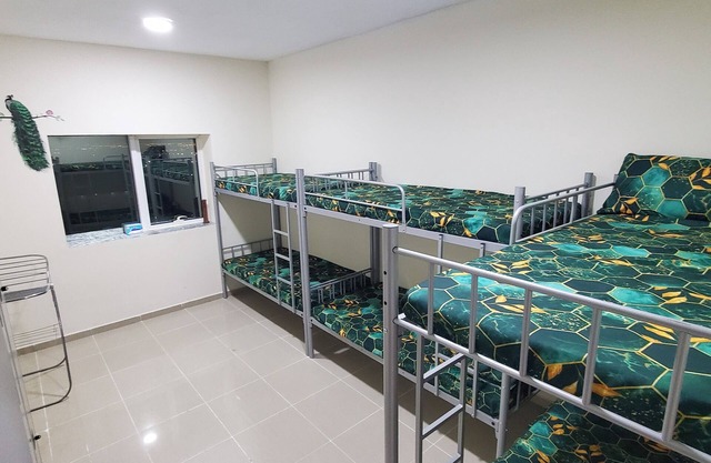 Homely Hostel - Spacious and clean bedspace in prime location on Al Wahda Street