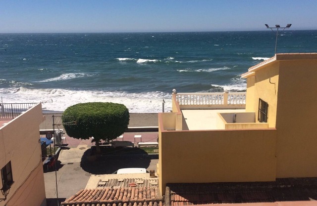 House a few steps from the sand, with views