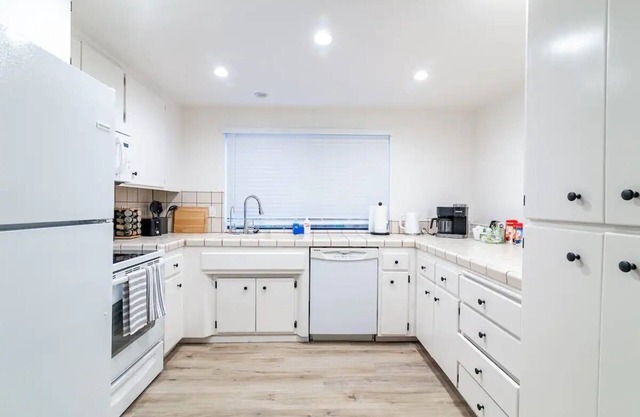 House with nice backyard, playground and many