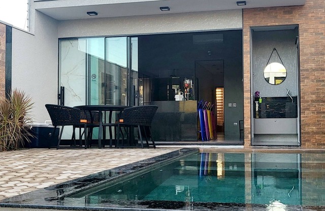 House with pool and waterfall near the Parana River - Porto Rico.