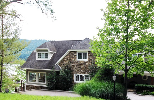 Huge Lakeside Lodge has stunning views and an easy walk to its big dock!