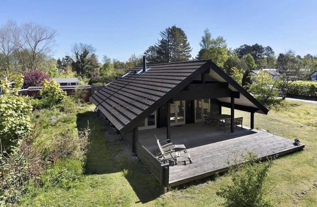 Hyggeligt og lyst feriehus nær stranden i Klint