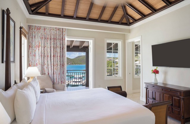 Island Room with Balcony Overlooking Calm Turquoise Caribbean Waters | 3 Units