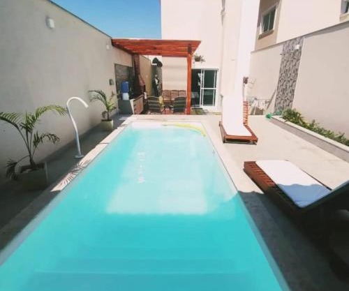 Ivana Imoveis - Casa com Piscina na Praia do Morro á 2 minutos da praia