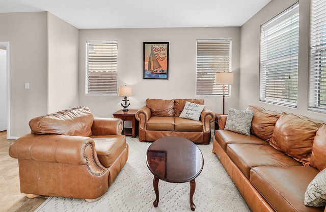 Kick back and relax in this calm, stylish space! FULLY FURNISHED!