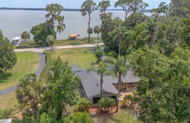 Lake front home directly on Lake Dora. Enjoy the sunrise/sunsets from the dock