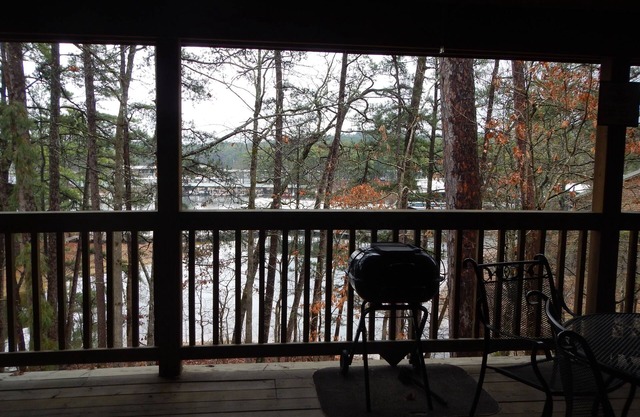 Lake view three bedroom, three bath cottage with private hot tub overlooking Lake Ouachita. by RedAwning