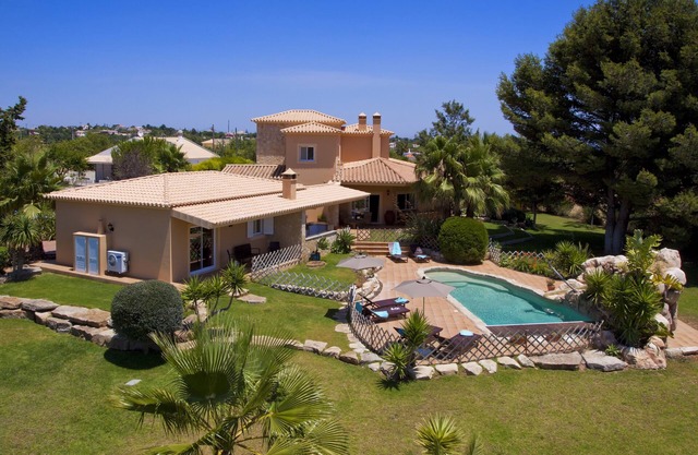 Large 6 bedroom villa with heated pool and sea view. Walking distance of beach