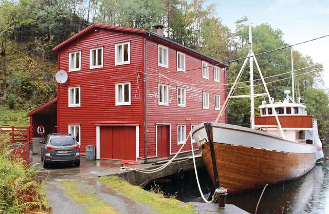 Large boathouse with three vacation apartments (N19683, N19684, N19685).