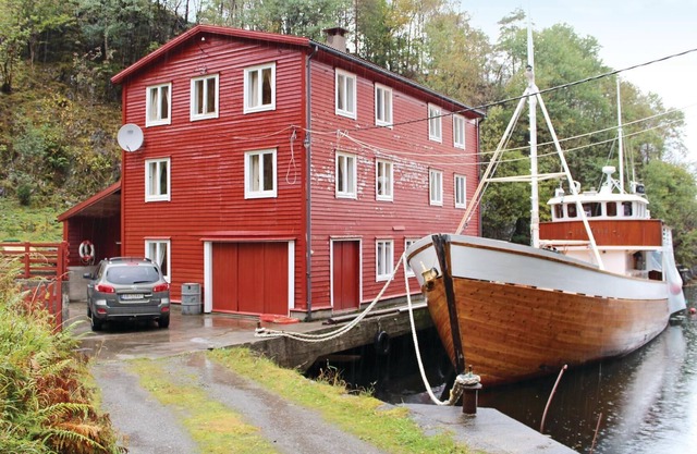 Large boathouse with three vacation apartments (N19683, N19684, N19685).