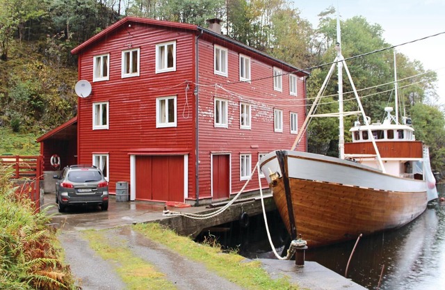 Large boathouse with three vacation apartments (N19683, N19684, N19685).