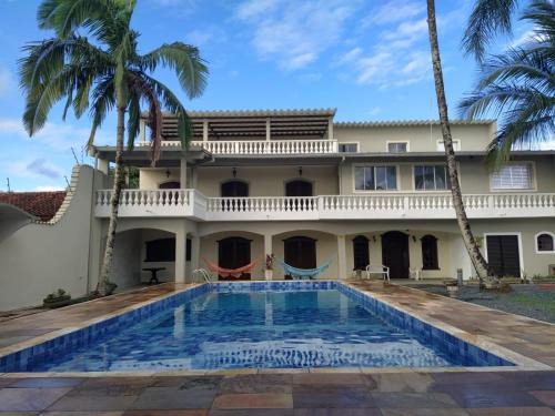 Linda Casa de praia com Super piscina 12x5 Novinha com 3 níveis, Wi-Fi, Tv led,jardim , churrasqueira completa