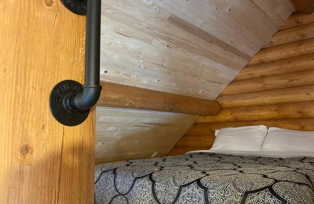 Lofted log cabin with fire table