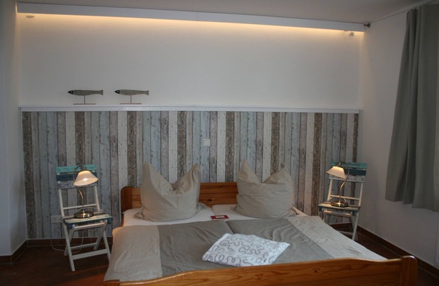 "Look around" - Scandinavian-style apartment with bookable barn sauna