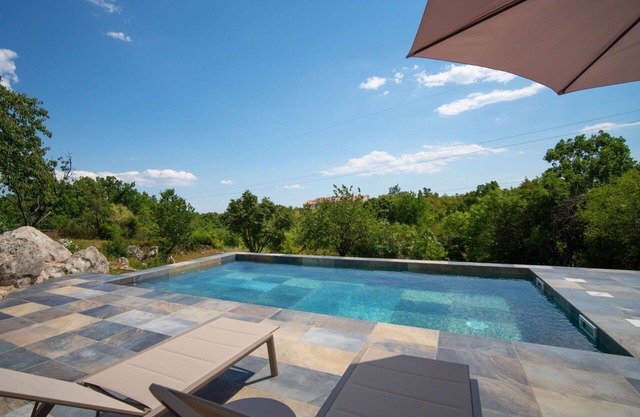 Lovely apartment for 4 people with A/C, WIFI, pool, TV, terrace and panoramic view