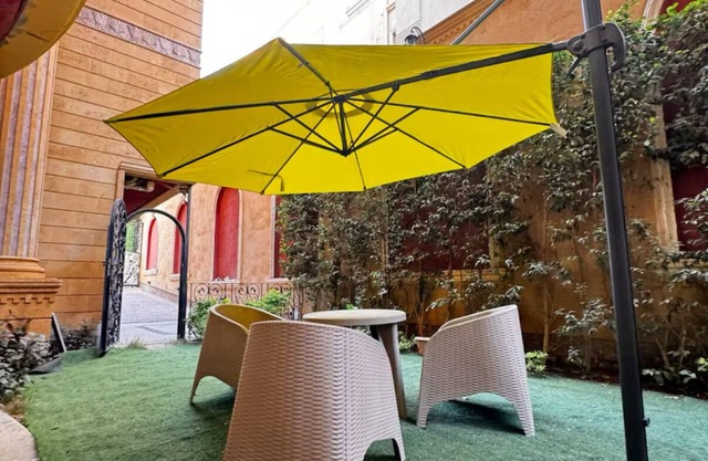 Luxurious 2BR apartment with a private sunny garden inNew Cairo with WiFi, AC