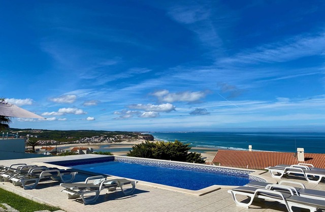 Luxurious villa with Fantastic views, heated pool, 5min walk to beach