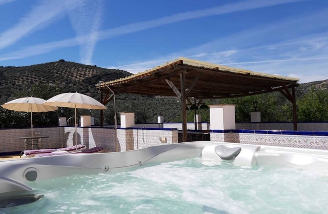 Luxury Poolside Apartment 1 over looking the Chlorine free Pool and Hot Tub