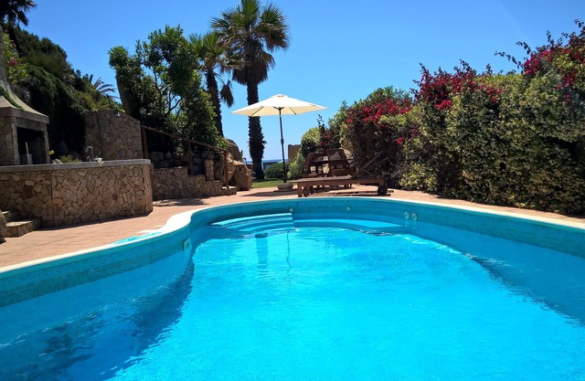 Luxury villa with private pool on the beach of Cala Caterina