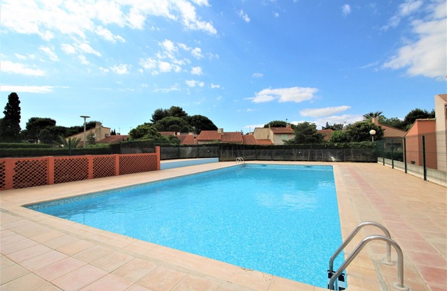 Maisonette T2 et parking dans résidence avec piscine