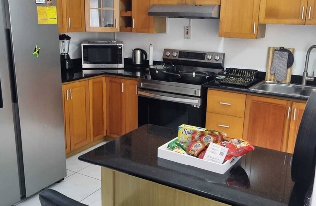 Mango Retreat in Mango Walk Country Club.Entire house with pool in Montego Bay