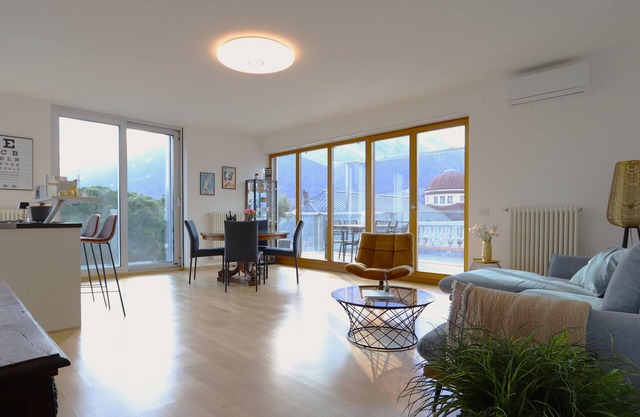 Merano center penthouse with terrace, garage, bike room and infrared sauna.
