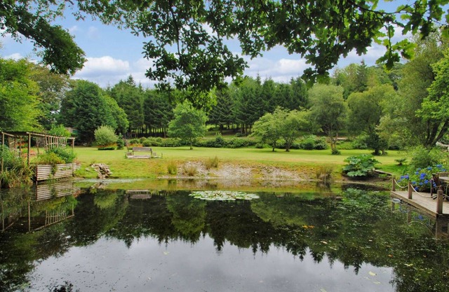 Millpool Lodge peaceful haven with 3 acre stunning gardens waterfalls and hottub