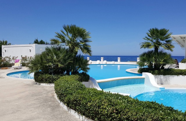 Mobile home with its own terrace, sea view, pool, beach and much more