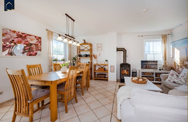 Modern vacation home in Korswandt on the lake with large garden and fireplace