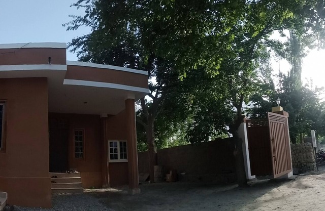 Mountain view with big garden and beautiful view of apricots cherry, treesand .