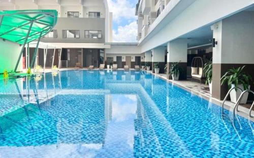 MY Modest Condo with Balcony - BE Residences near IT Park Cebu