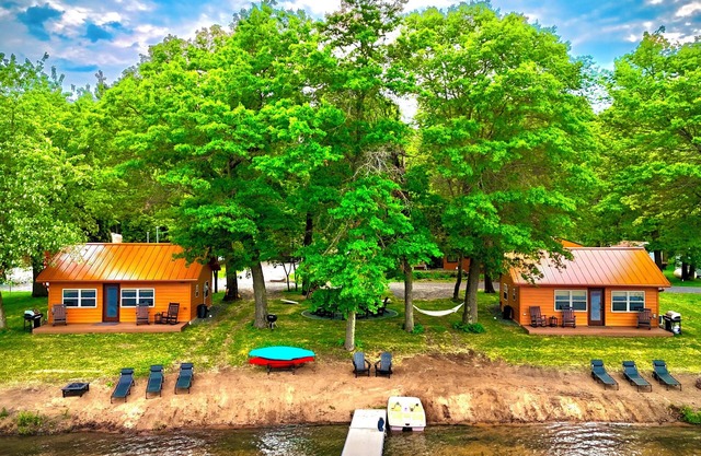 NEW 2 Cottages on the Lake Spooner WI Steps from sand of McKenzie Lake Sleeps 12