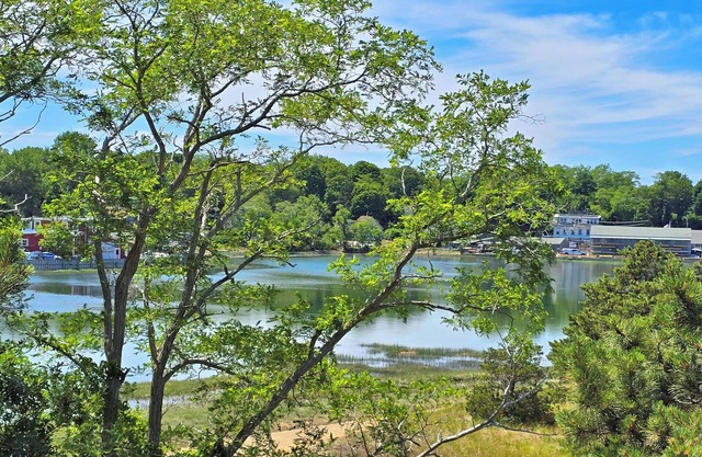 NEW LISTING! 4BD Contemporary-Duck Creek Views, 5-Min Walk to Uncle Tim's Bridge, Outdoor Shower