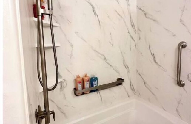 Oasis backyard. Pool and heated spa.