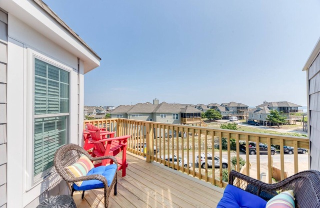 Ocean & sunrise views from your private balcony, just 250' from the beach!