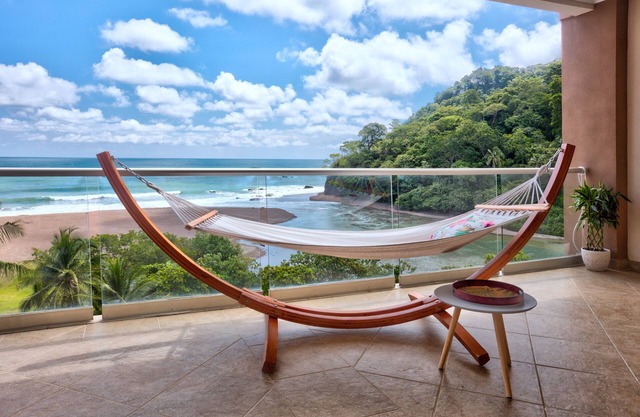 Oceanfront apartment with private balcony, stunning views & pool access