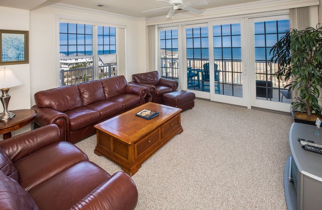 Oceanfront, corner condo with wrap-around deck, great views & on-site pool/gym